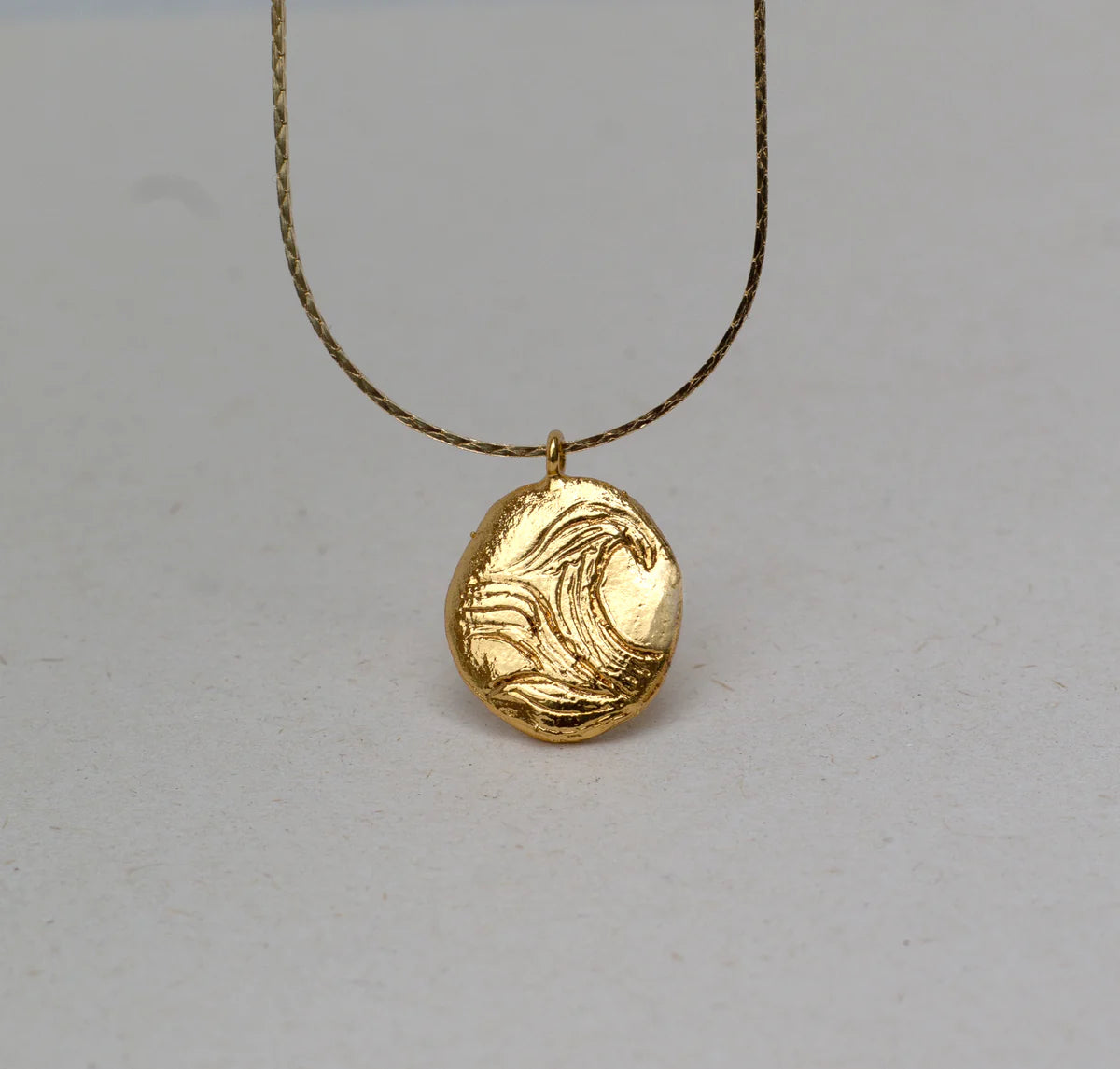 Collar Moneda Ola