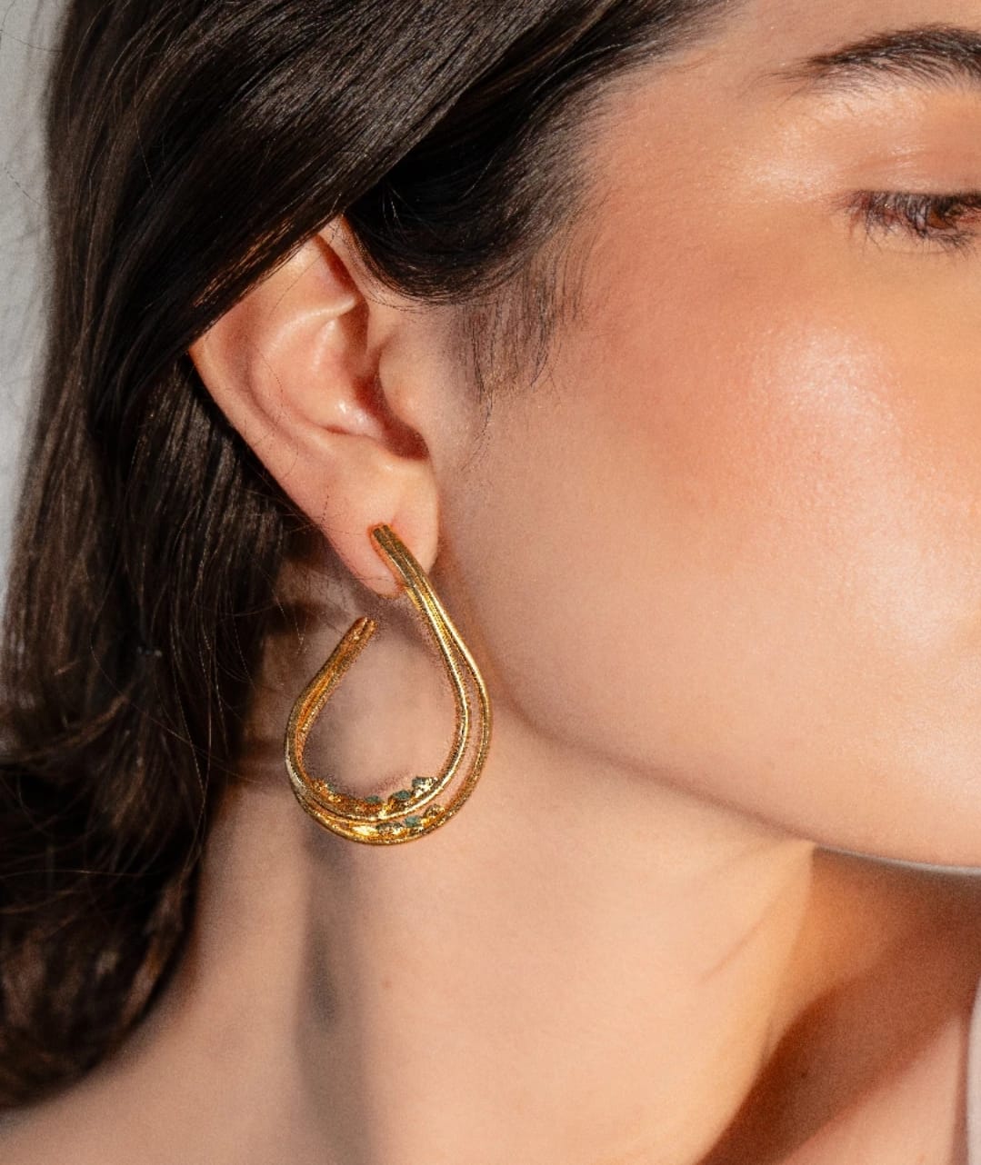 Aretes irregulares abiertos dobles